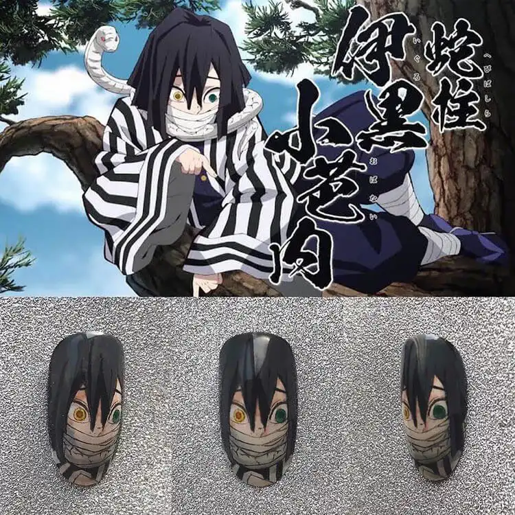 23 Anime Nail Designs to Show Your Love for Anime and Manga - Jujutsu Kaisen Sukuna 18 Mitsuri Kanroji Love Hashira nails featuring her signature pink and green colors with heart patterns.
