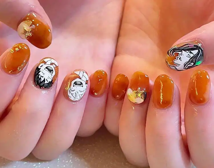 23 Anime Nail Designs to Show Your Love for Anime and Manga - Jujutsu Kaisen Sukuna 4 Orange nails with character art from Tokyo Revengers, showcasing bold and creative anime styling.