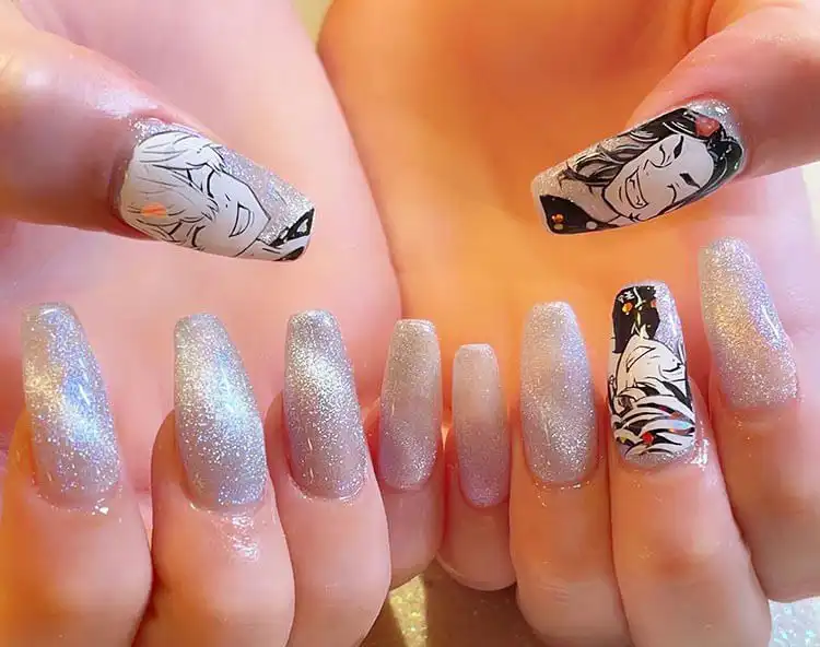 23 Anime Nail Designs to Show Your Love for Anime and Manga - Jujutsu Kaisen Sukuna 5 Sleek silver nails with Tokyo Revengers character art and gang symbols, offering an edgy anime look.