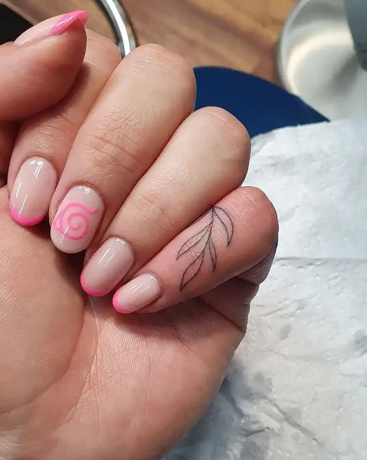 23 Anime Nail Designs to Show Your Love for Anime and Manga - Jujutsu Kaisen Sukuna 8 Pink Leaf Village nails with the iconic Konoha leaf symbol from Naruto, a delicate anime tribute.