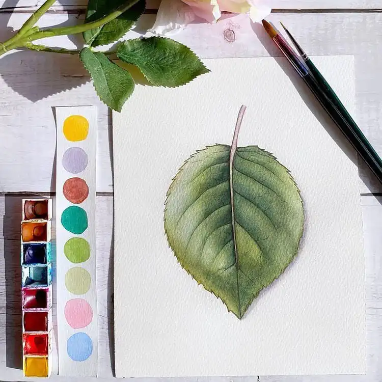 Highly realistic watercolor painting of a green leaf, capturing intricate veins, textures, and subtle color variations.