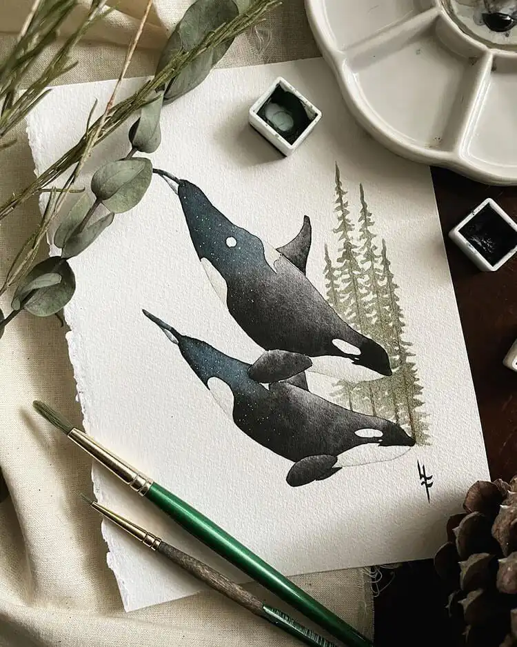 Collection of majestic watercolor whales, depicting their grandeur and movement in deep ocean blues.
