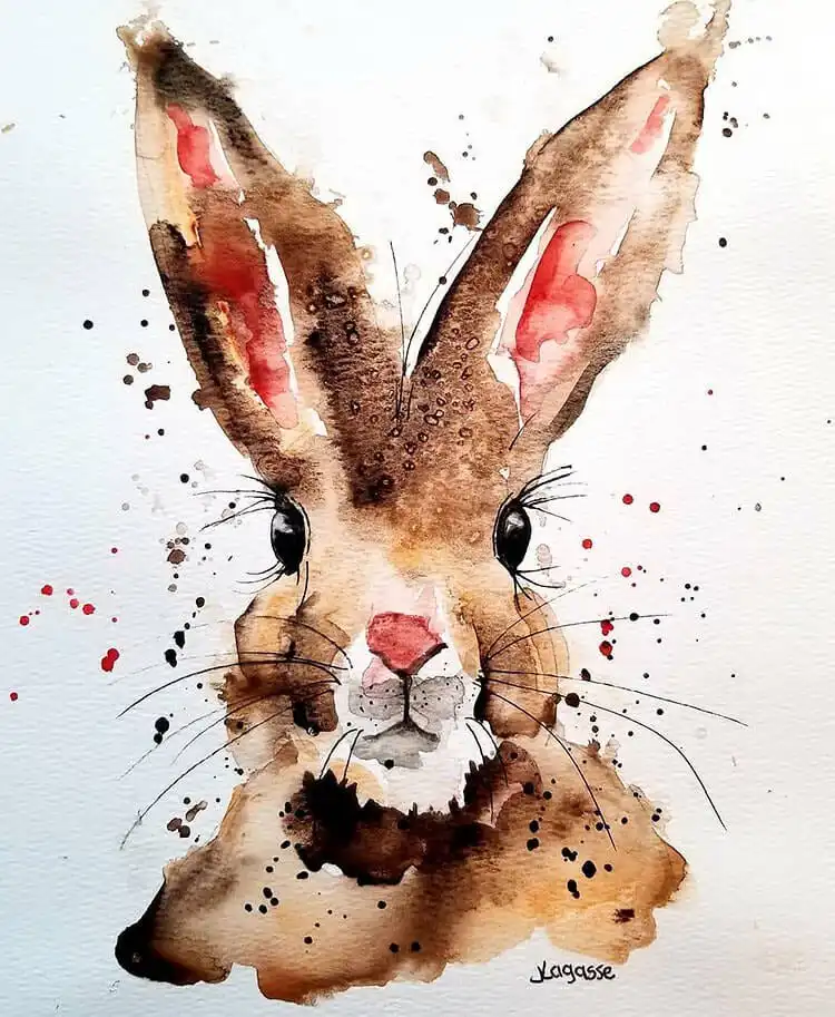 Expressive watercolor rabbit painting with artistic paint splatters, showcasing a unique and dynamic style.