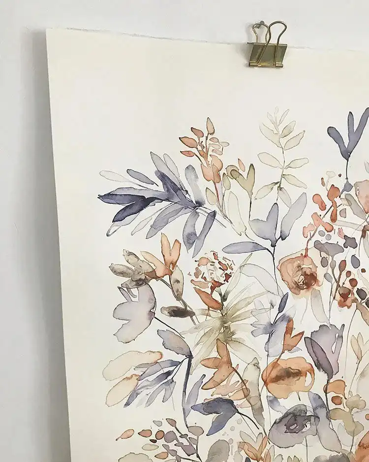 A collection of watercolor flowers in various shades of blue, demonstrating monochromatic depth for 25 Watercolor Flower Ideas for Beginners.