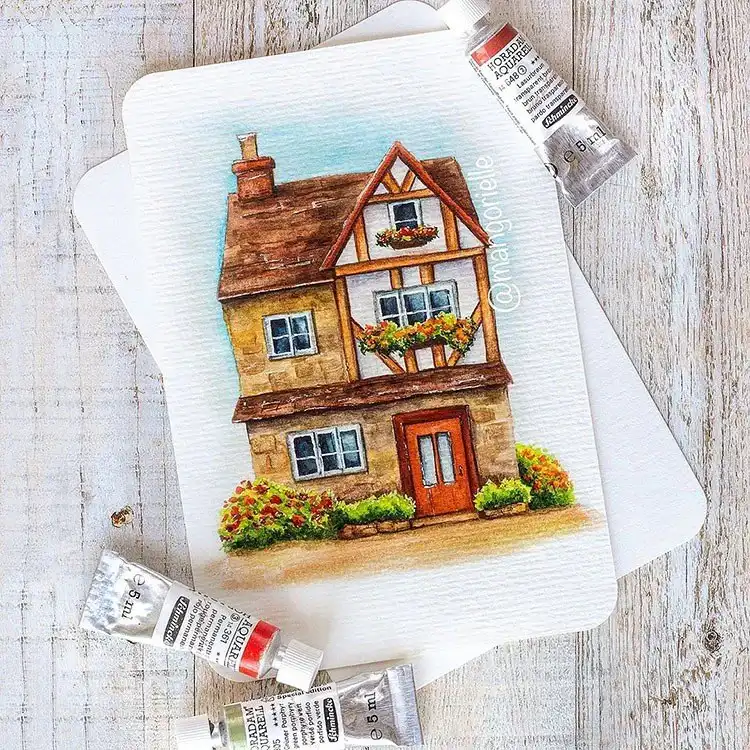 Watercolor cottage with vibrant flowers around it, a charming subject for art