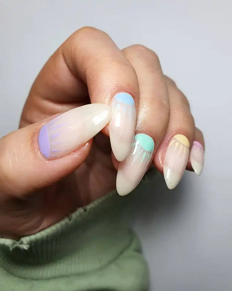 Sunshine pastel acrylic nails with soft, blended colors, creating a serene and beautiful gradient effect.