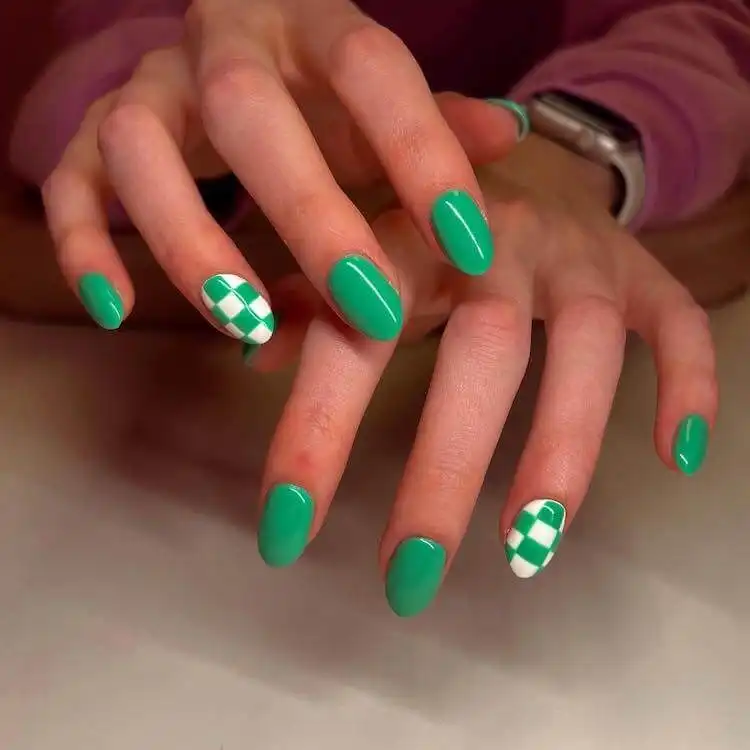 Edgy green checkerboard acrylic nails, featuring a bold geometric pattern for a striking and modern look.