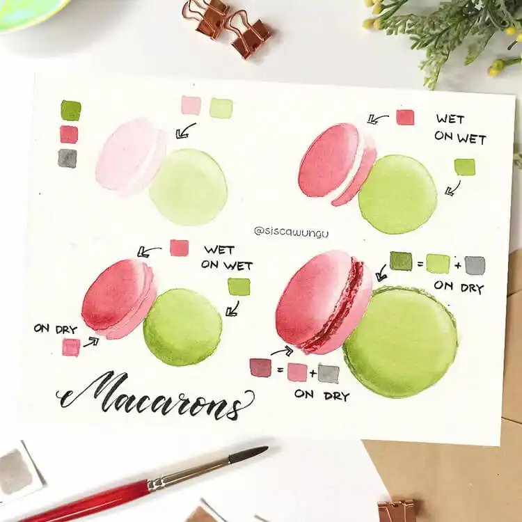 Watercolor painting of colorful macarons with delicate shells and creamy filling.