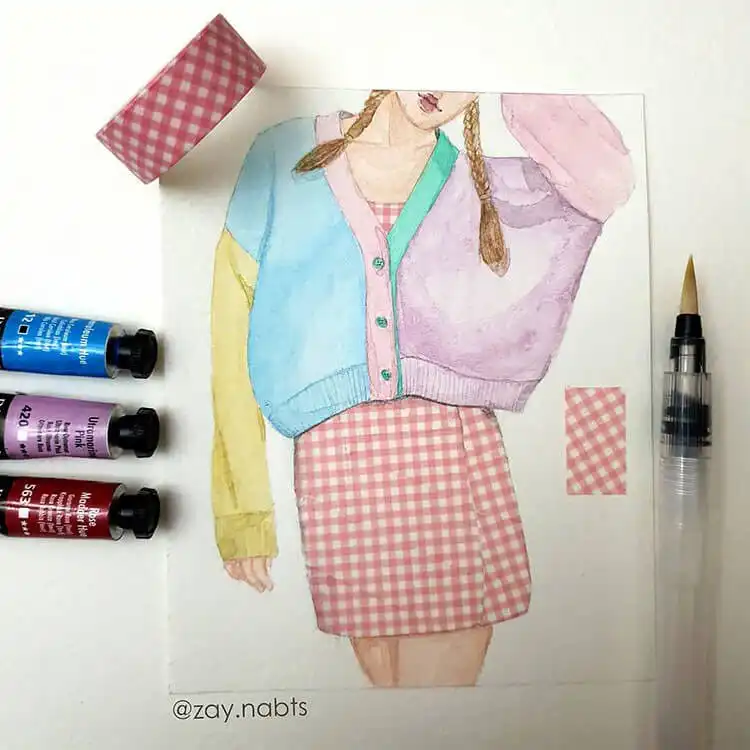Pastel pink dress with an oversized cardigan, illustrating a feminine and soft look
