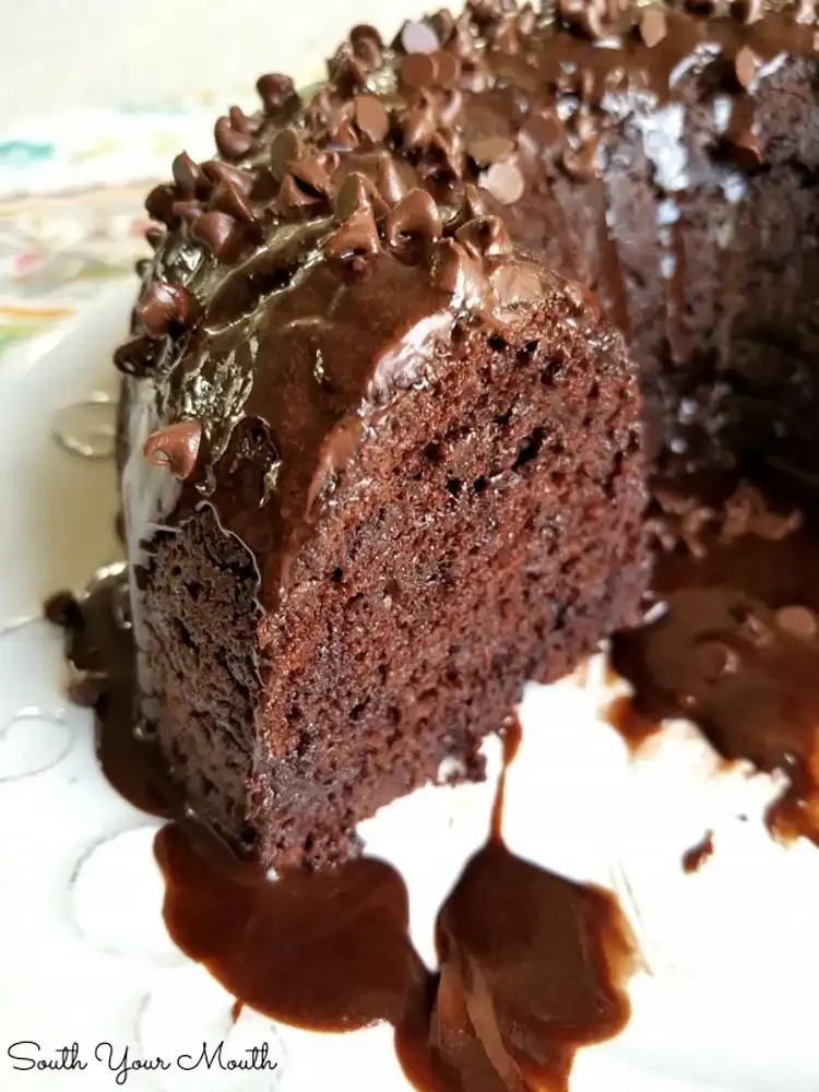 A tempting slice of Impossible 5-Ingredient Chocolate Cake, showcasing its moist crumb.
