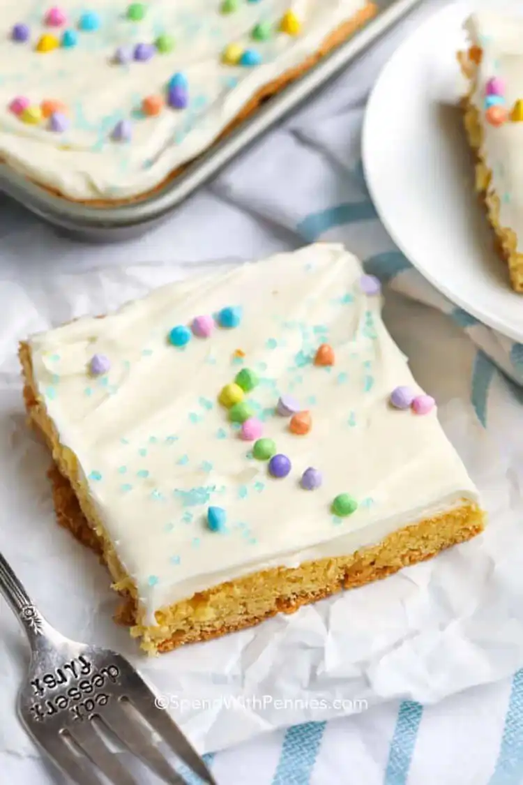 A beautifully frosted Cake Mix Sheet Cake that Tastes Homemade, ready to serve.