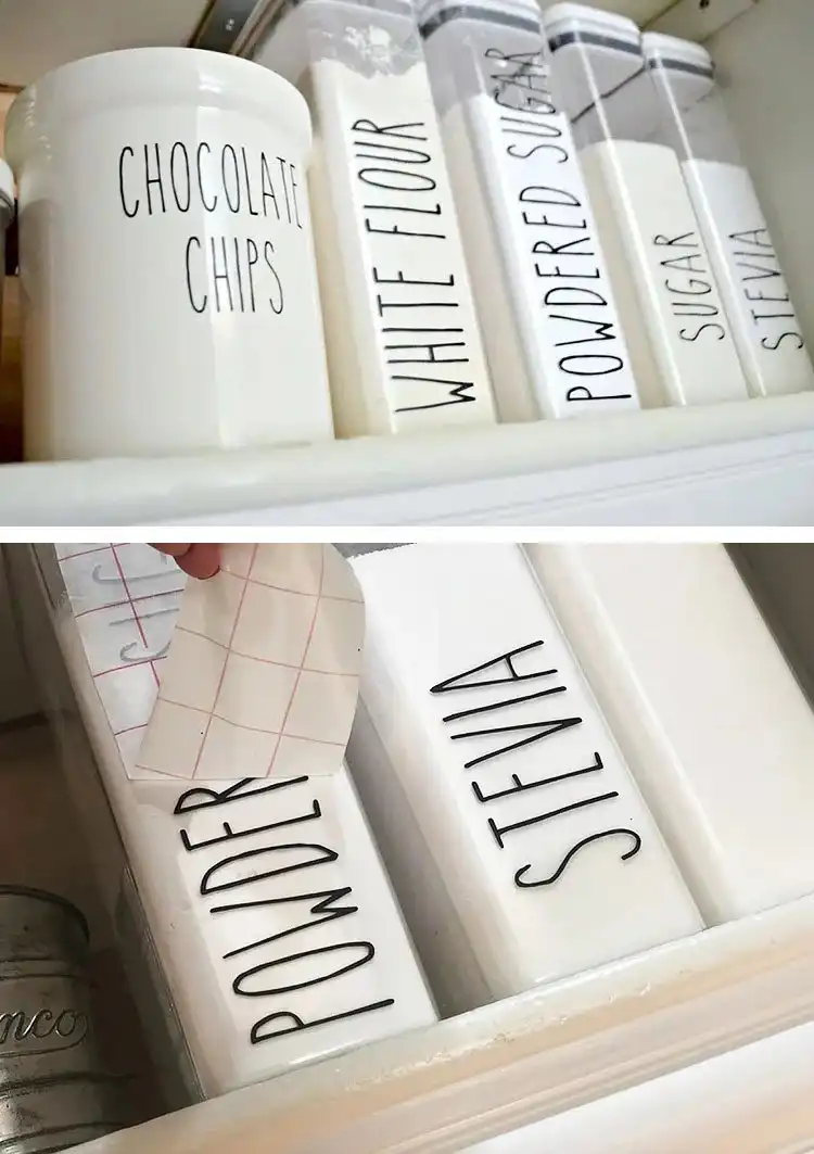 Glass kitchen canisters with farmhouse-style Rae Dunn inspired white labels, organized neatly on a pantry shelf.