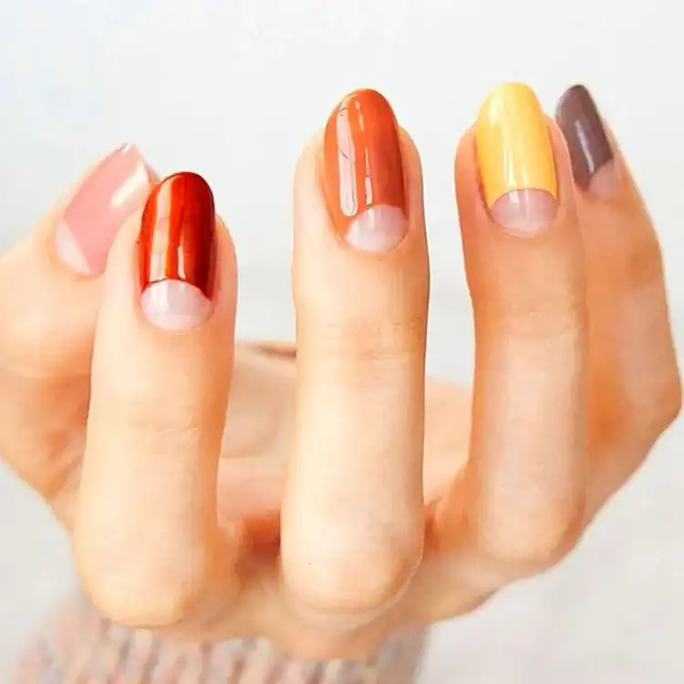 Acrylic Fall Coffin Nails with Orange and Brown Polish with Glitter 15 Modern Fall Acrylic Coffin Nails featuring a contemporary design with diverse autumnal color placements