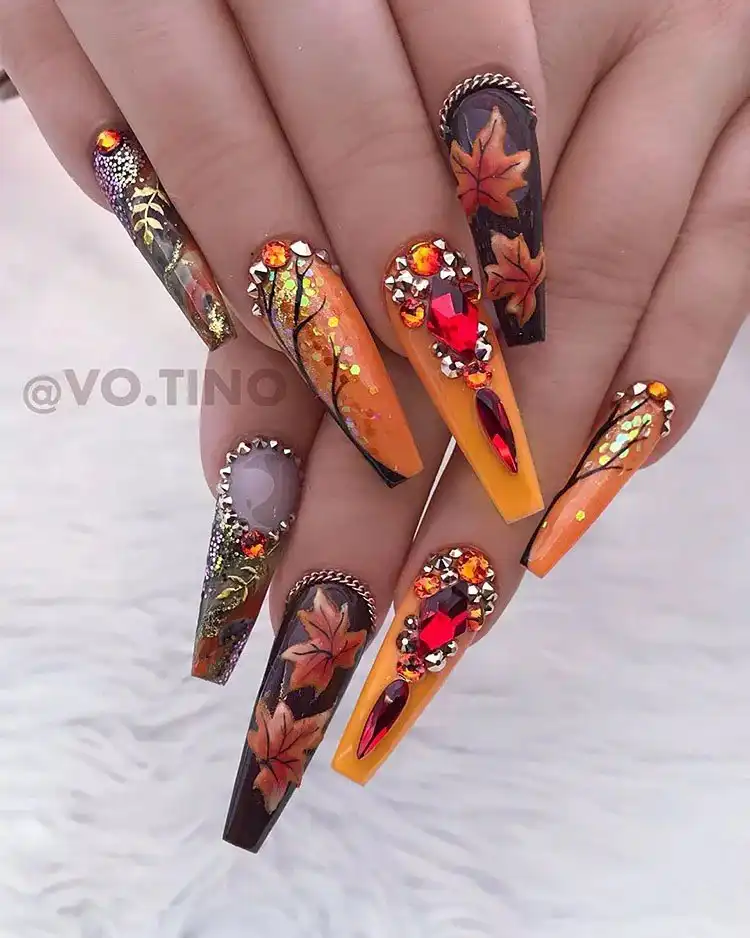 Acrylic Fall Coffin Nails with Orange and Brown Polish with Glitter 24 Autumn Colors and Glitter on Stiletto Acrylic Nails, a perfect festive look for fall in rich hues