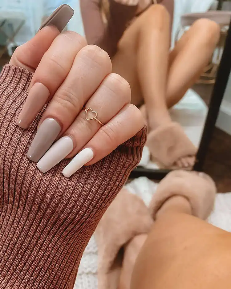Acrylic Fall Coffin Nails with Orange and Brown Polish with Glitter 4 Neutral Toned Acrylic Coffin Nails in Muted Earthy Hues, perfect for a subtle and elegant fall look