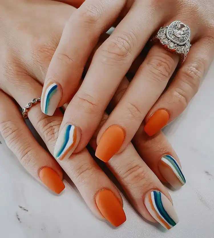 Acrylic Fall Coffin Nails with Orange and Brown Polish with Glitter 7 Vibrant Orange, Blue, and White Acrylic Coffin Nails, a fun and creative color scheme for autumn