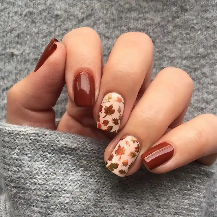 Acrylic Fall Coffin Nails with Orange and Brown Polish with Glitter 8 Acrylic Coffin Nails with Fall Leaves Design, capturing the essence of changing foliage with delicate motifs