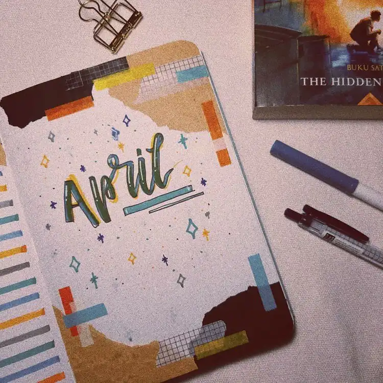 An April bullet journal cover page with a retro theme, featuring unique colors and shapes for a vintage feel.