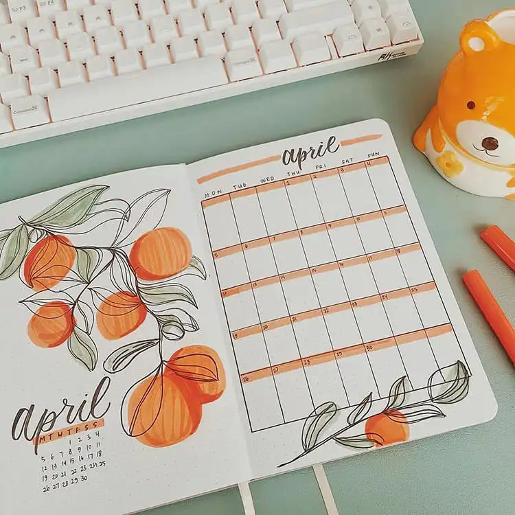 An April bullet journal cover page combined with a mini calendar, decorated with a fresh fruit design.