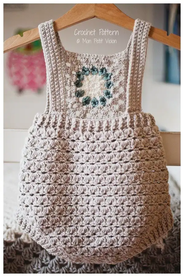 Unique Granny Square Romper featuring colorful granny squares assembled into a charming design, from Baby Romper Free Crochet Patterns & Paid - DIY Magazine