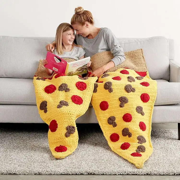 A large, soft crochet s'mores plushie, perfect for cuddling.