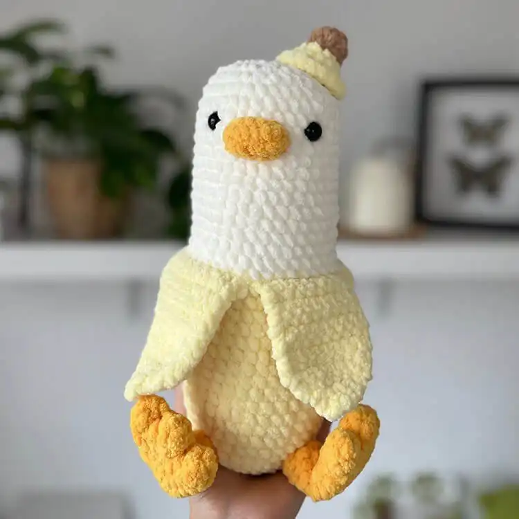 Unique Bananagoose crochet pattern amigurumi, a creative banana-goose hybrid plushie.