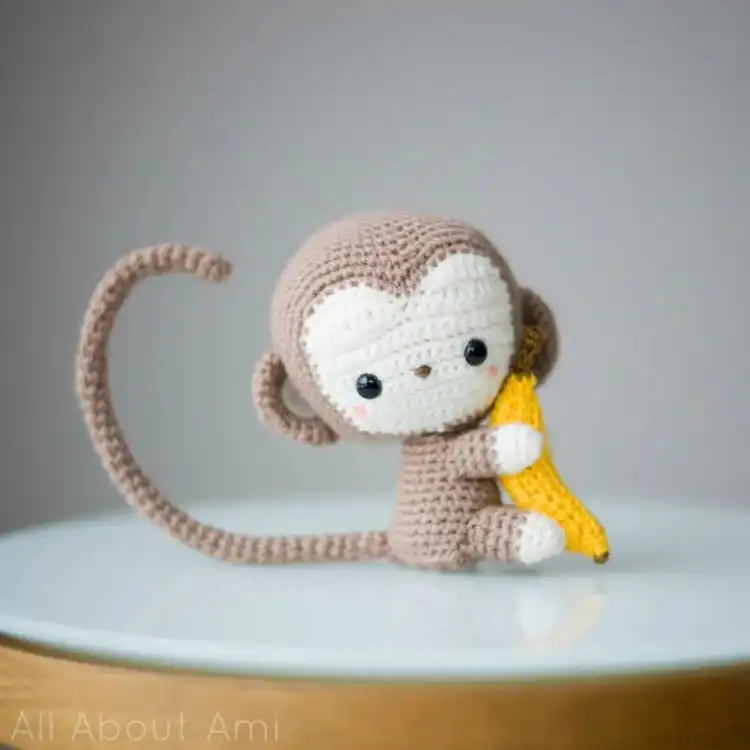 Playful Monkey Amigurumi crochet pattern with helpful photo guides.