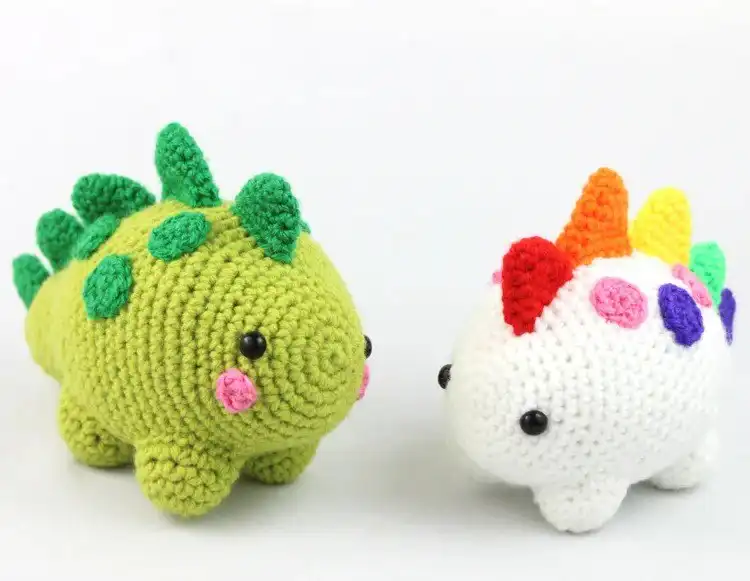 Collection of tiny, colorful Dinosaur Amigurumi crochet plushies, perfect for beginners.