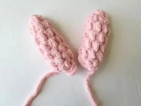 Beginner-Friendly Free Bunny Lovey Crochet Pattern Baby Gift 8 Two finished crocheted bunny ears, shaped and ready to be attached to the lovey's head.