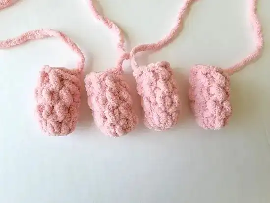 Beginner-Friendly Free Bunny Lovey Crochet Pattern Baby Gift 9 Four finished crocheted legs for the bunny lovey, uniform in size and shape.