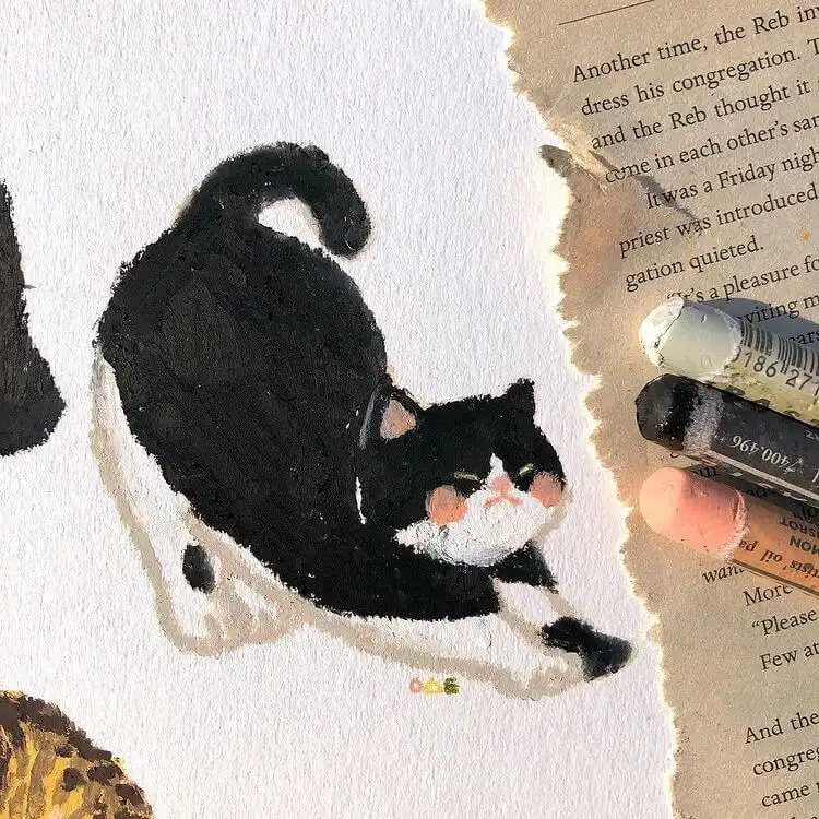 Beginners Oil Pastel Art and Drawings - Cat Drawing 6 Beginners oil pastel drawing of a charming black and white cat with salmon accents on its cheeks and ears, showcasing contrast for art beginners.