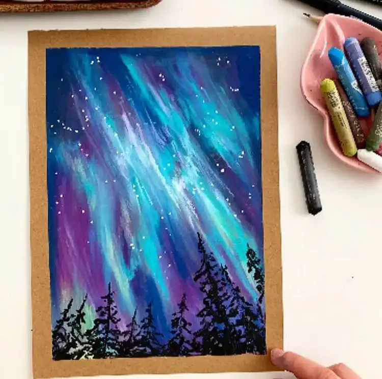 Beginners Oil Pastel Art and Drawings - Cat Drawing 9 Vibrant oil pastel drawing of a blue and purple sky, inspiring artists to experiment with color blending and atmospheric effects.