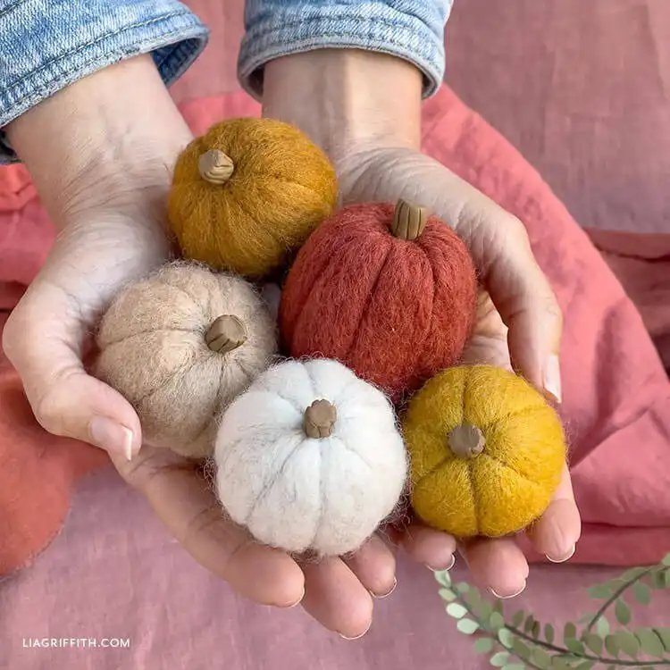 Best Needle Felting Ideas, Kits, and DIY Tutorials 14 Assortment of mini needle felted cacti plants in various green shapes, ideal for small decor spaces