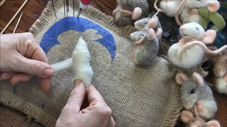 Best Needle Felting Ideas, Kits, and DIY Tutorials 7 Cute needle felted sleepy mice curled up, showcasing soft textures and adorable poses