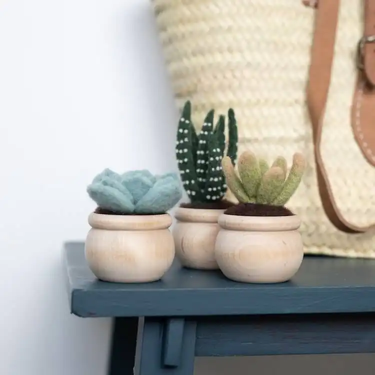 Best Needle Felting Ideas, Kits, and DIY Tutorials 8 Needle felting kit for crafting various succulent plants in different green shades, complete with pot