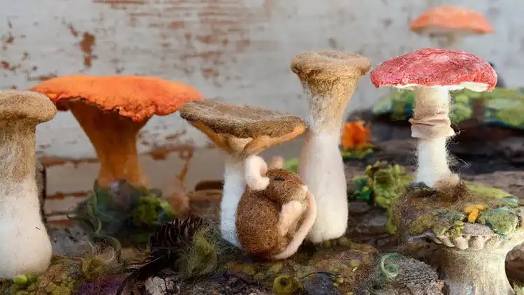 Best Needle Felting Ideas, Kits, and DIY Tutorials 9 Fluffy needle felted sheep, emphasizing the textured wool coat and simple, endearing form