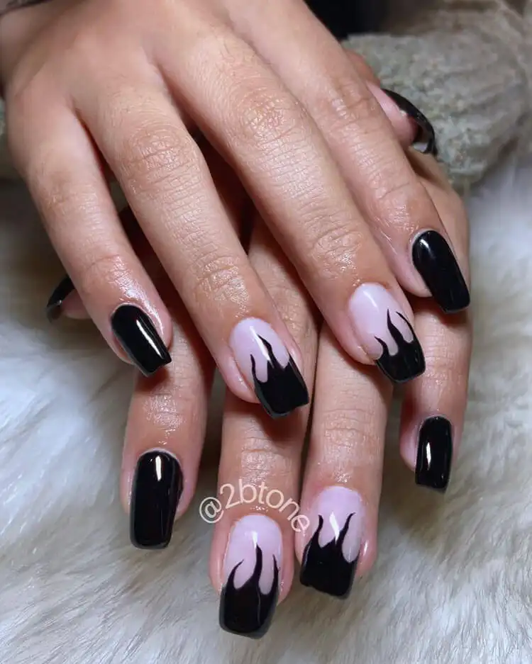 Black Nail Designs - Black Flames and Checkerboard 11 Short square nails adorned with stylish black flame designs, proving versatility in length.