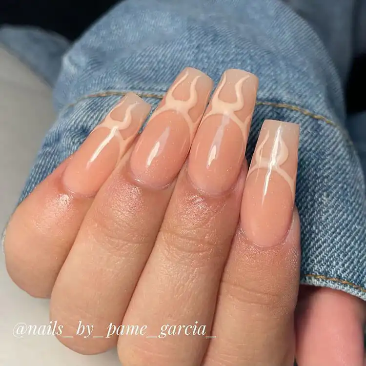 Black Nail Designs - Black Flames and Checkerboard 3 Nude base nails with subtle, delicate flame designs and a touch of glitter for an elegant finish.