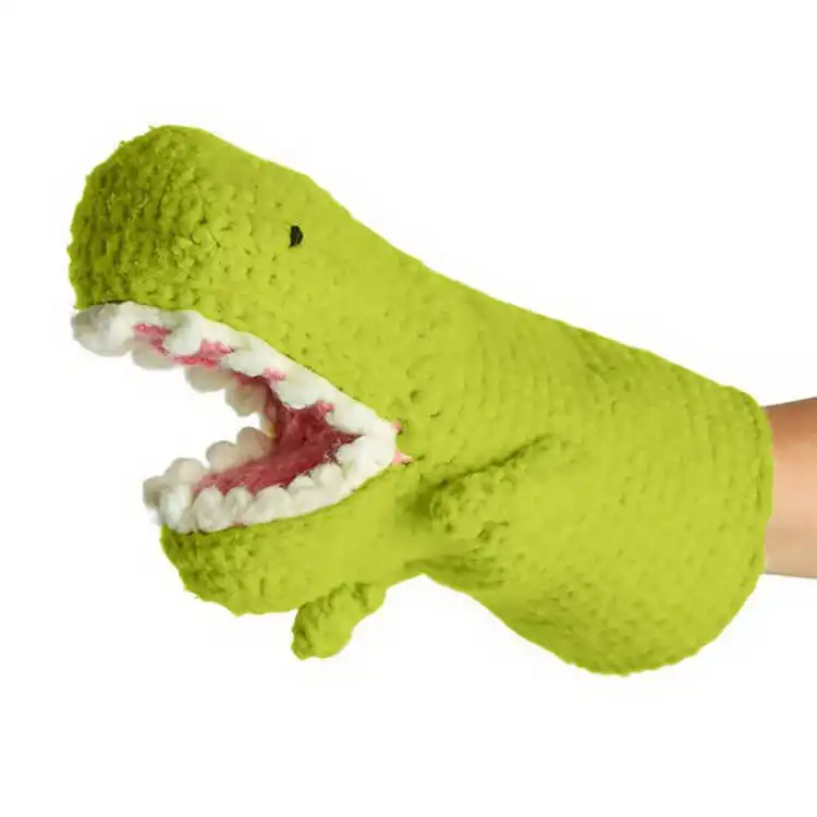 Green crochet Dinosaur Puppet designed for a child's hand, featuring soft yarn and simple shaping for interactive play.