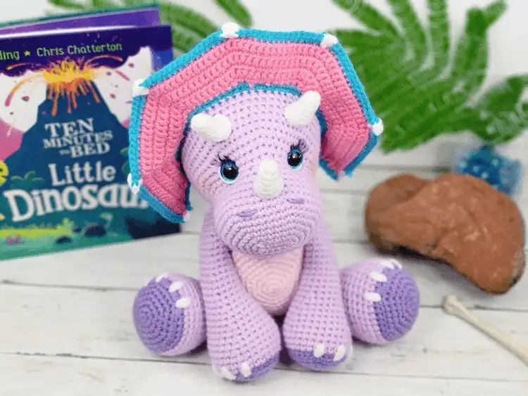 Large crochet Tabitha the Triceratops, approximately 16 inches tall, showcasing its robust design and classic features in a soft, earthy tone.