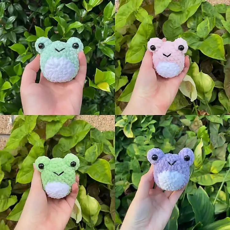 Cute green crochet Philbert the Frog amigurumi with a gentle smile and large eyes
