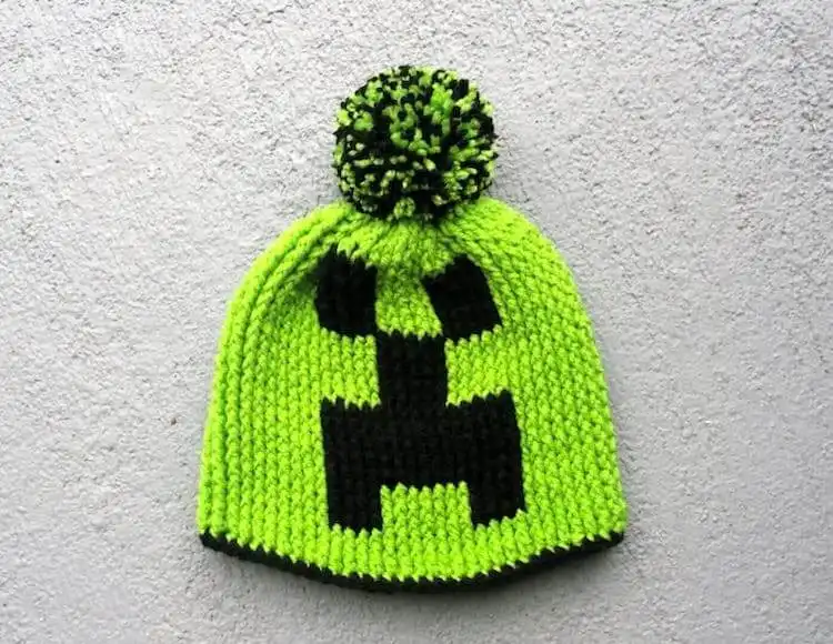 Crocheted green Creeper beanie hat with black pixelated face