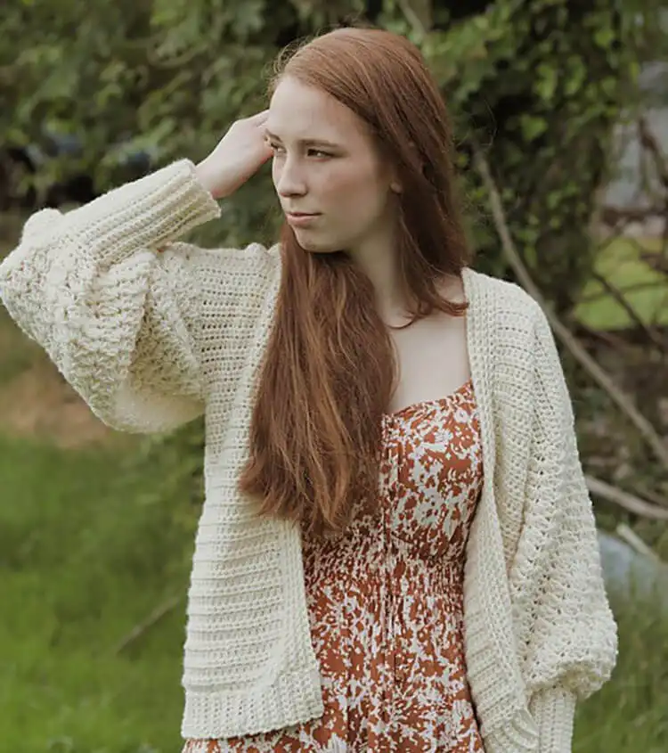 Creative Crochet Sweater Patterns - Vintage Brands Design and Birds Design 15 Stylish Balloon Sleeve Cardigan featuring voluminous sleeves, a sleek design, and rich texture.