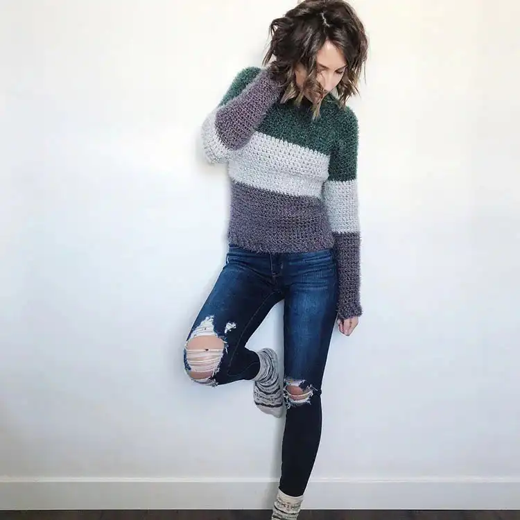 Creative Crochet Sweater Patterns - Vintage Brands Design and Birds Design 24 Cozy Equinox Sweater made with Red Heart Hygge Yarn, offering a soft and plush texture for intermediate crocheters.