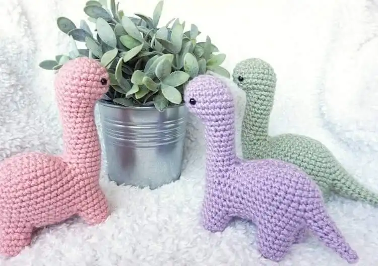 Crochet Animal Pattern - Free Crochet Baby Sloth 4 Easy No Sew Amigurumi Dinosaur crochet pattern for beginners to intermediate.