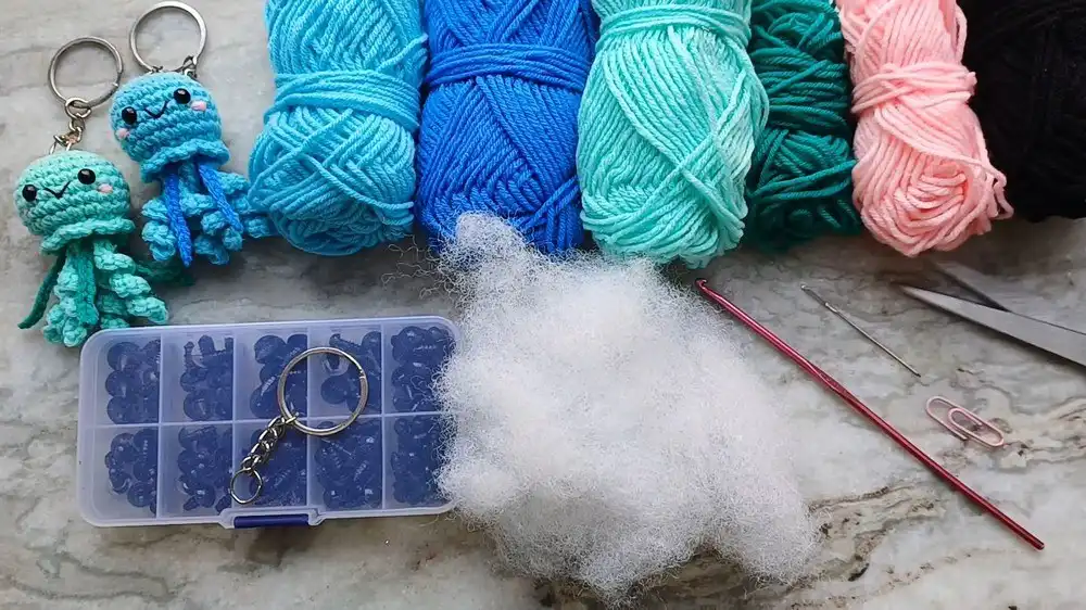 Close-up of crochet stitches and a stitch marker indicating continuous rounds for amigurumi.