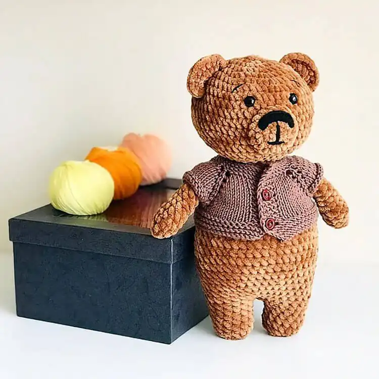 Larger, huggable crochet teddy bear toy with a classic, friendly appearance.