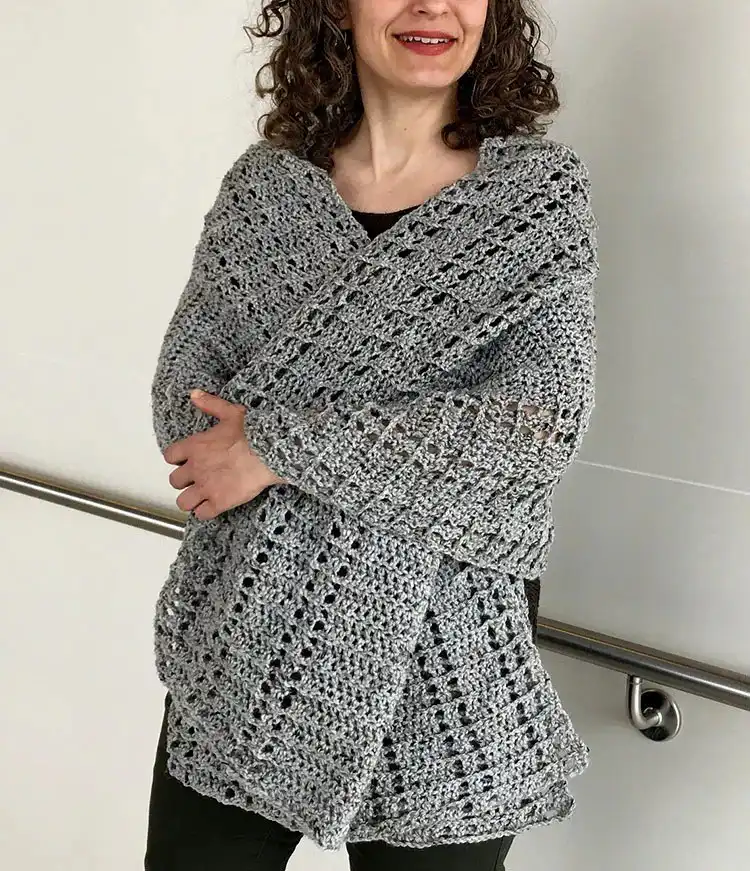 A simple and elegant Easy Shawl in a solid neutral color, showcasing its versatile design.