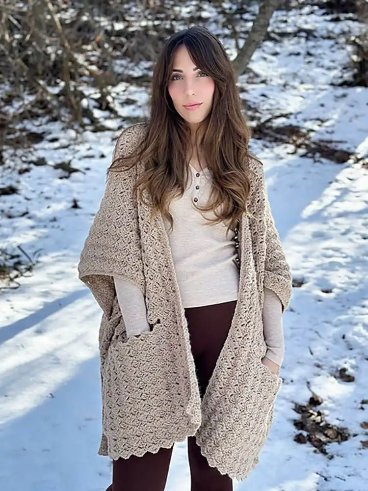 An oversized Woodlands Blanket Wrap with visible pockets, made in a warm, earthy tone.