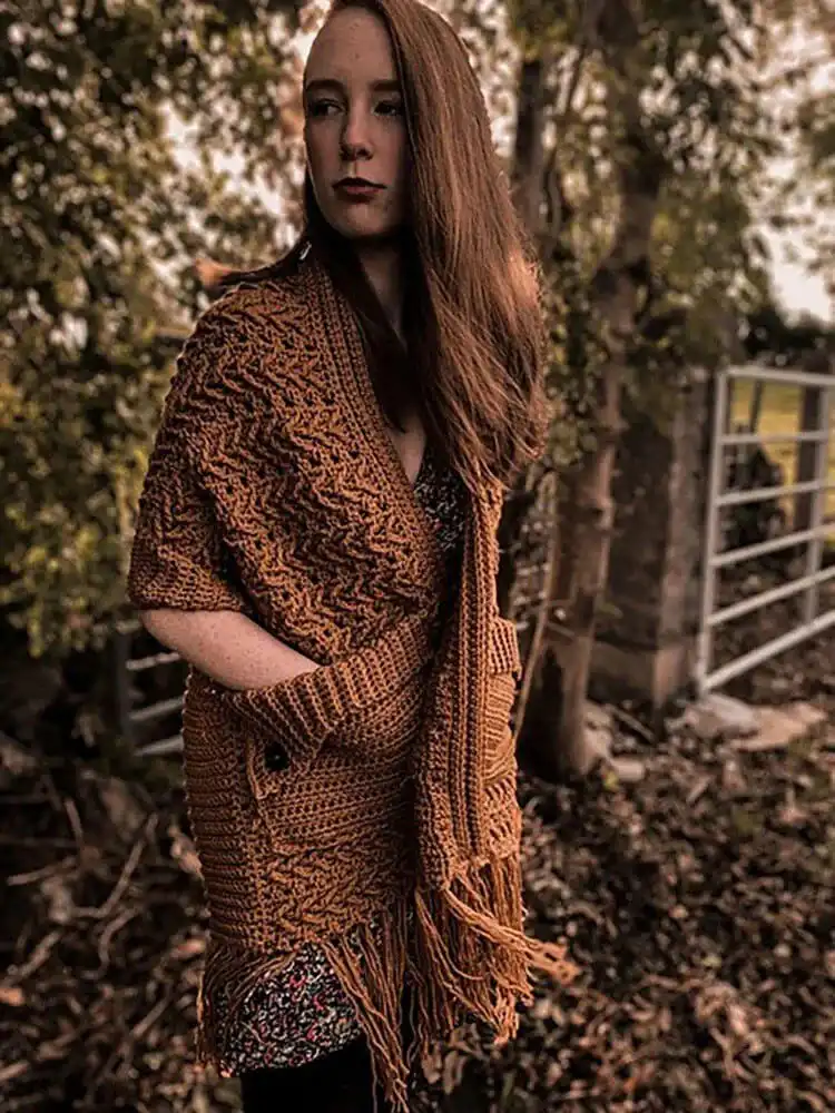 A practical Pocket Shawl featuring large, integrated pockets and a lovely textured stitch in a rich color.